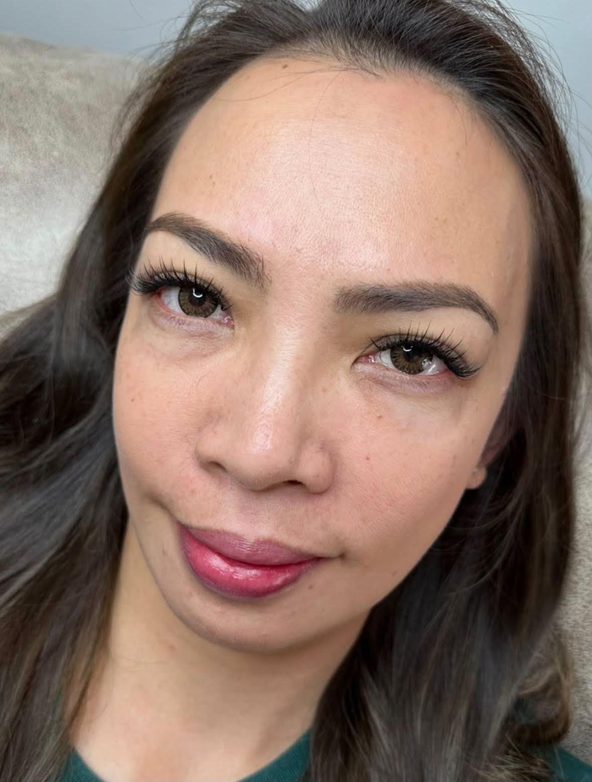 Client portrait with wispy eyelash extensions